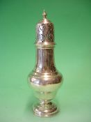 A Silver Sugar Caster Of typical baluster form, the pierced cover with finial, raised on a domed