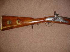 A Percussion Rifle With walnut full stock. Overall length 39". Condition report: Trigger guard a