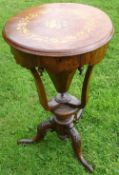 A Victorian Walnut Work Table The foliate marquetry hinged top revealing a silk lined