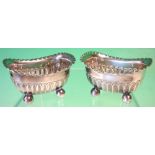 A Pair of Silver Salts Of half fluted form with crimped rims, raised on ball feet. Maker: James