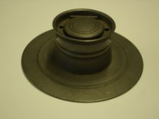A Pewter Capstan Inkwell. Condition report: Good, lacks the liner