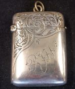 A Silver Vesta Case Of cushion form, engraved with foliage and initials RJW. 2" high. Birmingham