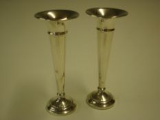 A Pair of Silver Bud Vases Of trumpet form. 4" high. Birmingham 1971. Condition report: One vase has