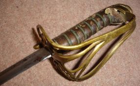 A Victorian Sword With scabbard. Length of blade 32". Condition report: The hilt is loose, leather
