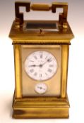 A French Gilt Brass Carriage Clock With alarm and repeater, the 8 day movement numbered 2977 on back