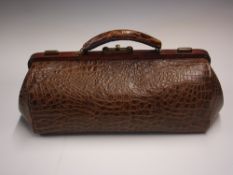 A Leather Gladstone Style Bag Faux crocodile grained the closure with sliding brass locks, the
