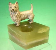 A Cold Painted Bronze Vesta Holder Formed as a West Highland terrier on a green onyx base with vesta