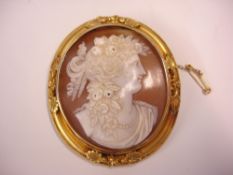 A Shell Cameo Brooch The mount and frame in 18ct gold. 66mm high overall. Condition report: Cameo