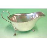 A Silver Sauce Boat Mappin and Webb. Of helmet form with shaped rim. 5" long excluding handle.