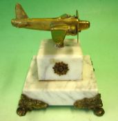 Trench Art A brass model of a WW2 aircraft. Mounted on an associated stepped marble base. Length