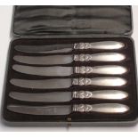 Georg Jensen A cased set of six silver dessert knives. Import and date marks for 1930. Condition