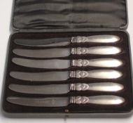 Georg Jensen A cased set of six silver dessert knives. Import and date marks for 1930. Condition