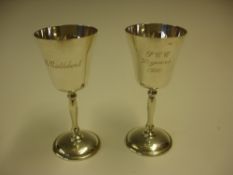 A Pair of Silver Goblets With slightly ogival bowls, both engraved. 4 ½" high. Birmingham 1991.
