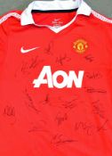 Signed 2010 Manchester United home football shirt - child's replica, signatures include Anderson,