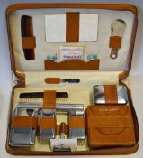 A gentleman's travel kit circa 1950s in original case and in complete unused condition. Awarded to