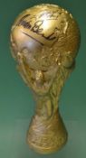 FIFA World Cup Trophy a gold plated composition reproduction of the trophy, 30cm in height,