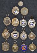 Collection of various silver/enamel Medals awarded to Cyril Done for his sporting achievements,