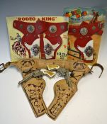 Group of Western related toys to include two carded Rodeo King holster sets, one having a single the