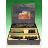 Hornby 0 Gauge M1 goods train set with locomotive, tender, two trucks and track layout. Boxed,