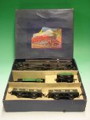 Hornby 0 Gauge M1 goods train set with locomotive, tender, two trucks and track layout. Boxed,