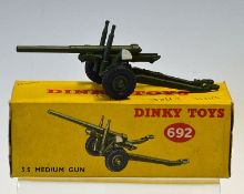 Dinky Toys 5.5 Medium Gun No.692 in good condition with original box (writing on)