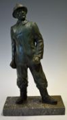 Large French marble based Fireman display ornament featuring a fireman in uniform posing mounted