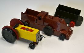 Chad Valley Bakelite train toy having brown body with black wheels together with a similar truck