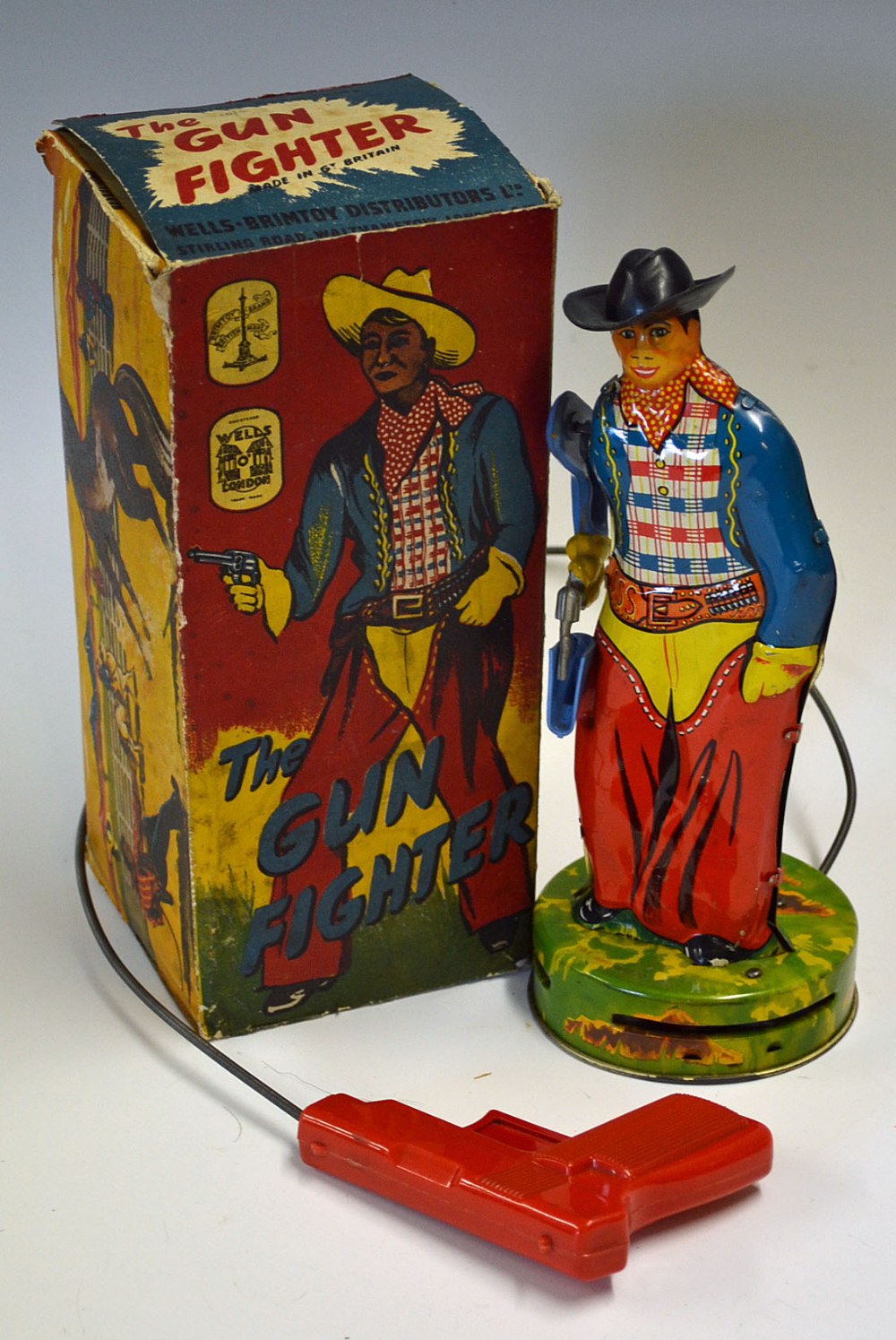 Wells Brimtoy (UK) Tinplate Gun Fighter and other Tinplate Toys - scarce 1950s tinplate Cowboy