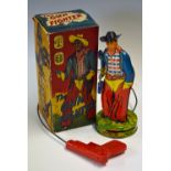 Wells Brimtoy (UK) Tinplate Gun Fighter and other Tinplate Toys - scarce 1950s tinplate Cowboy