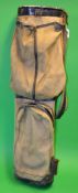 Good sturdy leather and canvas oval shaped golf club bag c/w large ball pocket and matching travel