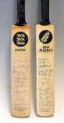 2x official England and New Zealand  miniature signed cricket bats c1990s - both signed in ink to