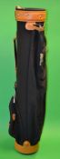 Fine and new black canvas and light tanned leather golf bag - made in England - circular shaped with