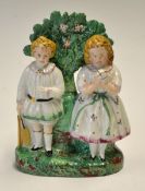 Original Vic Staffordshire ceramic cricket group of figures - comprising a boy holding a cricket bat