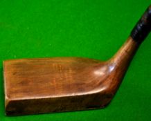 Jean Gassiat patent persimmon putter - with full brass sole plate - faded makers marks to the