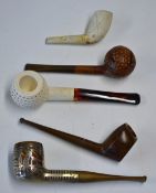 Interesting collection of various golf related smoking pipes to incl a briar pipe with sterling