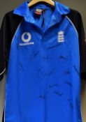 Official England Cricket signed ltd overs shirt - Black and blue short sleeved shirt sponsored by