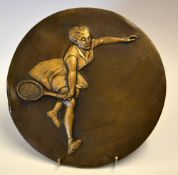 A large bronze tennis plaque c1950s - embossed with a lady tennis player running cross court playing