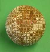 Silver Town  line pattern guttie golf ball - some red paint in fill to the name Silver Town ,