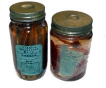 PRESERVED BAITS: (2) Pair of early Hardy glass bottled preserved baits, being Sand Eels and