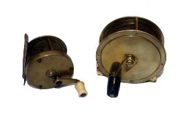 REELS: (2) An early all brass multiplier winch, 2.25 diameter, 1.5" wide, curved winding arm,