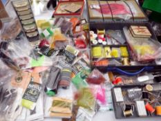 FLY TYING MATERIALS: Portable fly tying kit in carry case containing assorted tools, silks, threads,