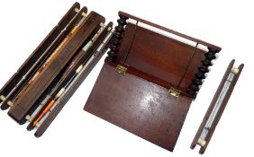 FLOAT WINDERS: (3) Early mahogany book style float/cast winder, 7"x3.75", twin hinged covers, turned