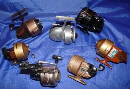 REELS: (7) Bache Brown Spinster USA threadline spinning reel, LHW, half bail, a Shakespeare