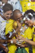 Roberto Carlos signed colour print in Brazil colours, overall 36 x 48cm, mfg.
