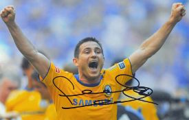 Frank Lampard signed colour photograph in Chelsea Away colours, overall 35.5 x 45.5 mfg.