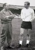 Sir Alf Ramsay and Bobby Moore signed black and white print, overall 32 x 47cm, mfg.