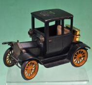 A delightful 1917 Vintage Ford Coupe model by Schuco of Germany with a Consul Old Timer cigarette