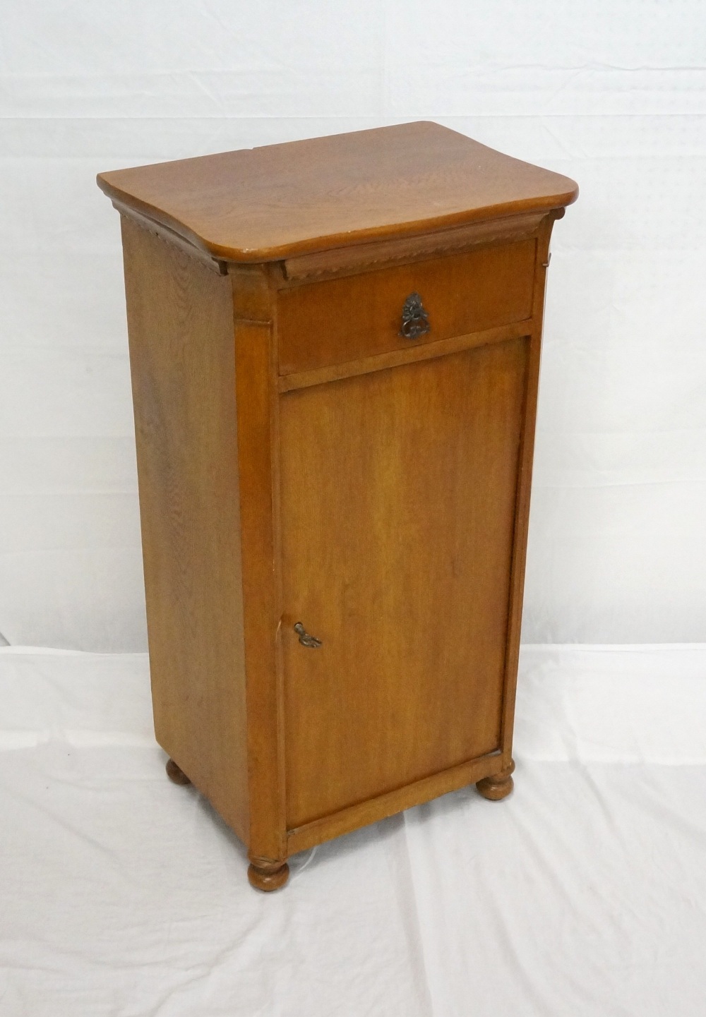 CONTINENTAL STAINED PINE BEDSIDE CUPBOAR