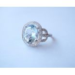 AQUAMARINE AND DIAMOND COCKTAIL RING