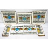 SET OF NINE EDWARDIAN LEADED STAINED GLA